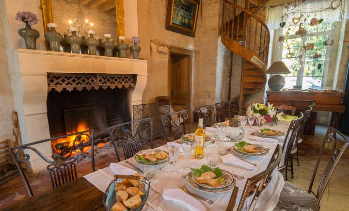 Dinner by the fireside at the Château de Clermont les Fermes B&B