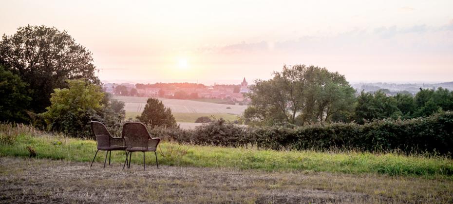 View over the Flanders hills from the Auberge du Vert Mont: a landscape of pasturelands, typical farms, orchards and hop fields.