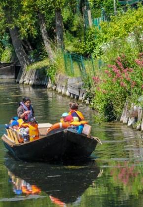 Visit the floating gardens in a peaceful boat ride 