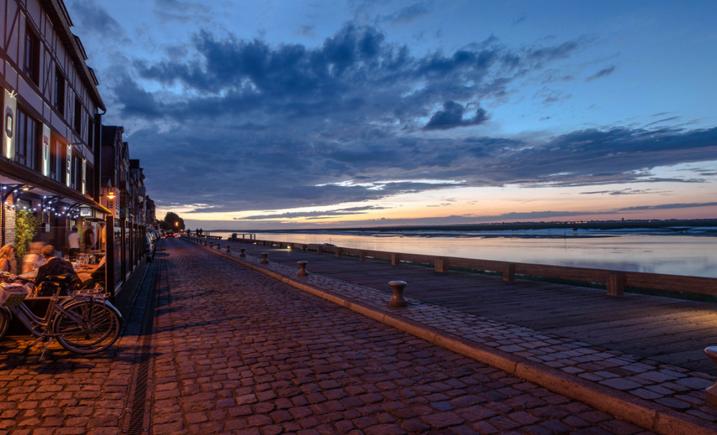 Watch the sun set over the enchanting Somme Bay