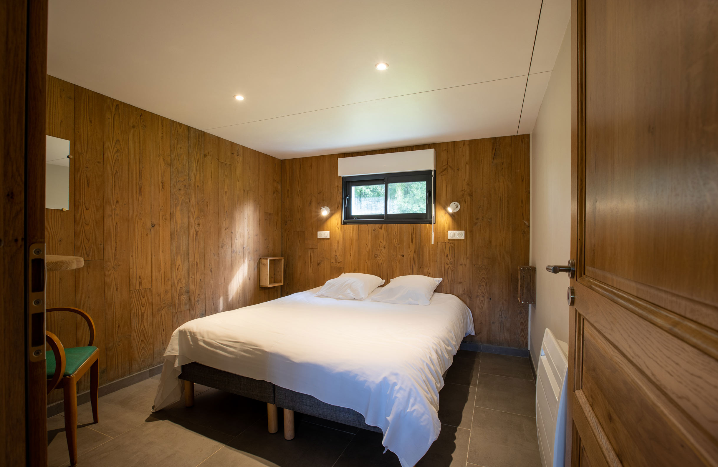 The master bedroom at Maison des Oiseaux at the Domaine du Lieu Dieu