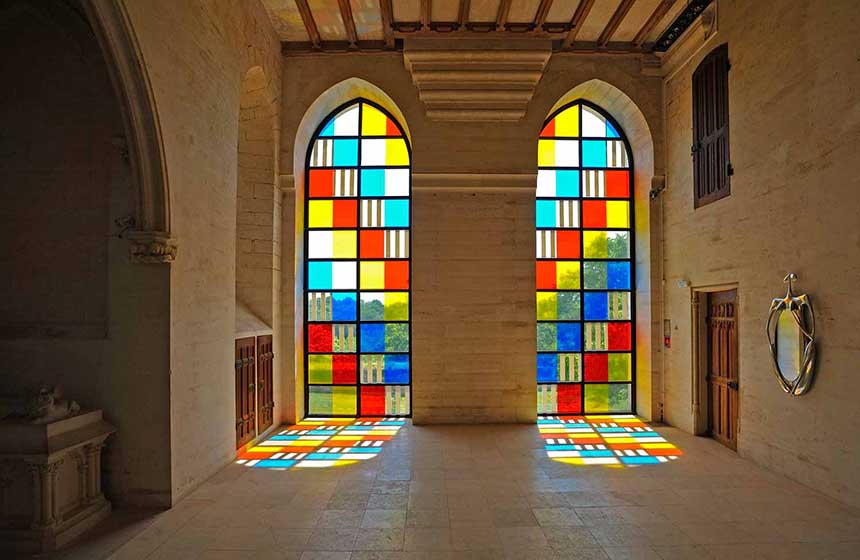 The striking stained-glass work of Daniel Buren on display at Donjon de Vez castle