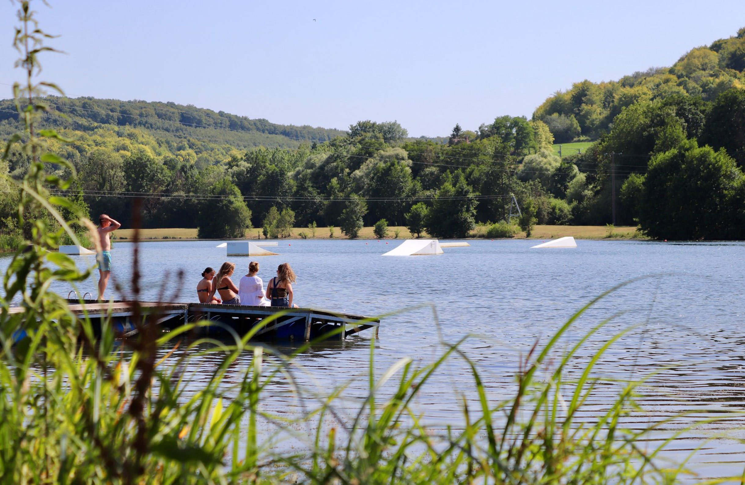 Domaine du Lieu Dieu’s lakes where you can enjoy activities like wakeboarding, pedalos, fishing and paddleboarding 