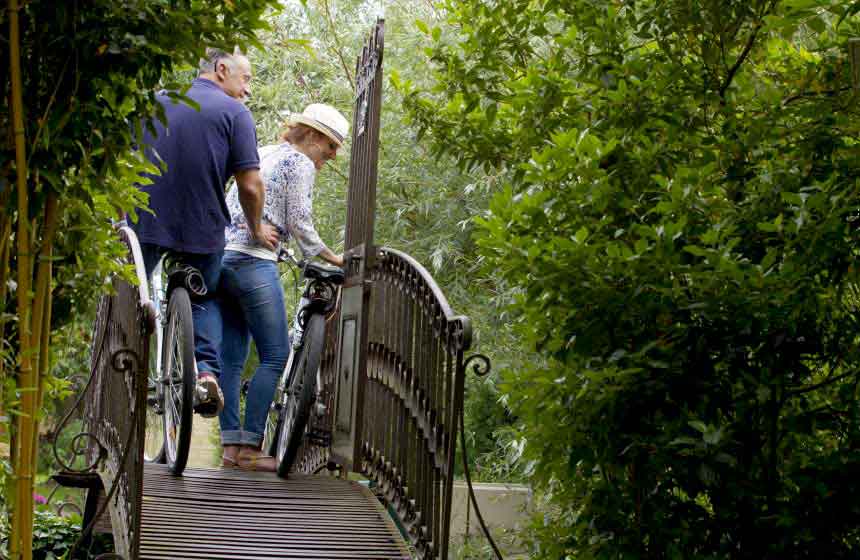 Cycling along the towpath along the Hortillonnages floating gardens in Amiens