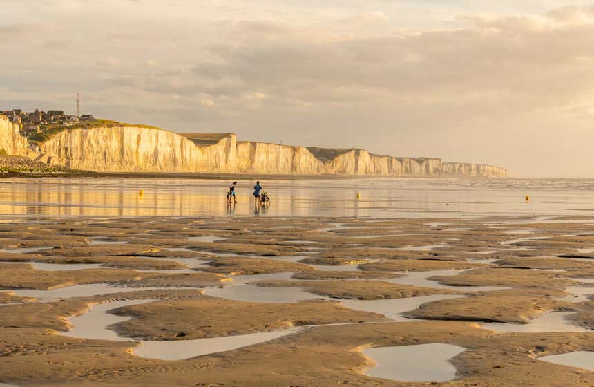 On the lookout for crabs on the vast beaches of the northern France coast