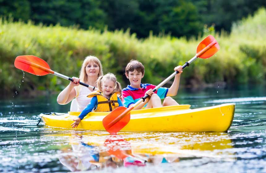 Discover the Ourcq canal by canoe during your family weekend break at Le Bois de Rosoy treehouse bed and breakfast in Northern France