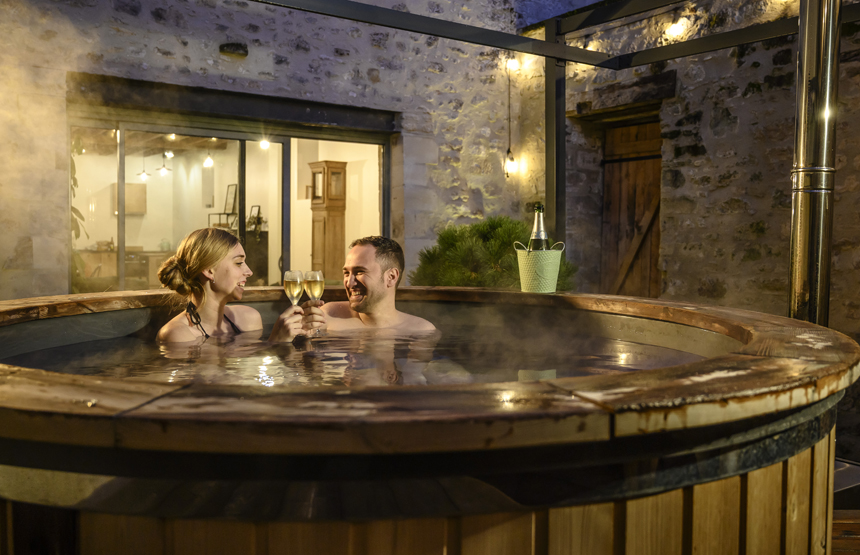 Enjoy rest and relaxation in the Nordic hot tub at Gite la Grange near Laon and Reims