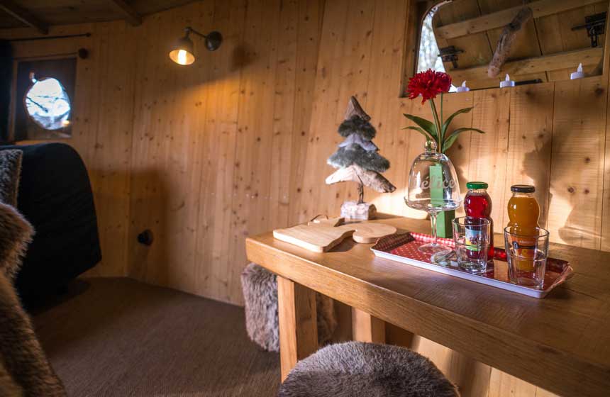 Decor on your family treehouse holiday in France is beautifully rustic yet modern and comfortable at the same time