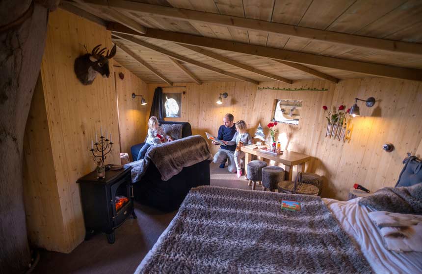 Decor on your family treehouse holiday in France is beautifully rustic yet modern and comfortable at the same time