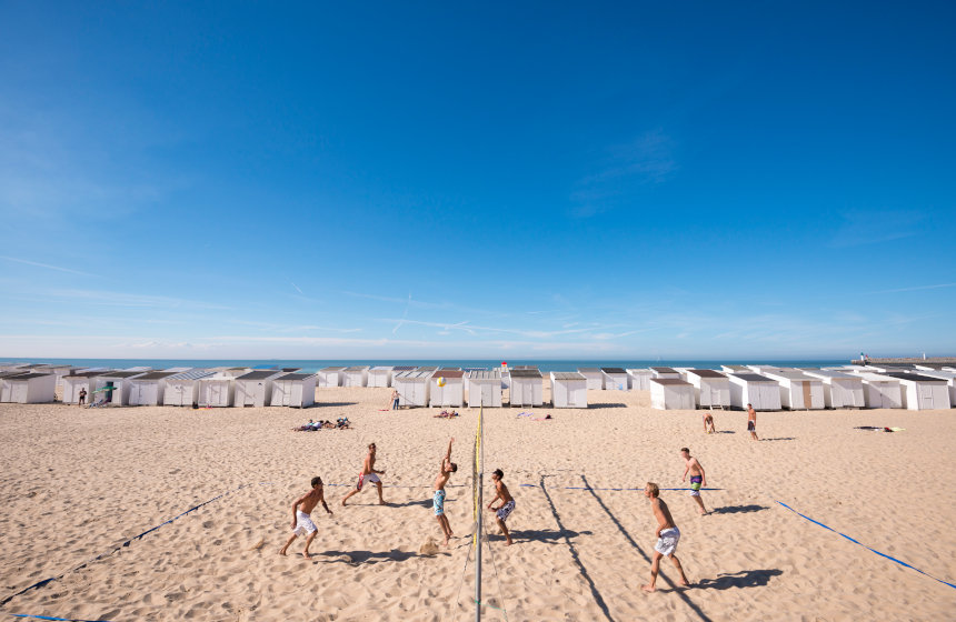 Take your shoes off and feel the sand on your feet in Calais beach