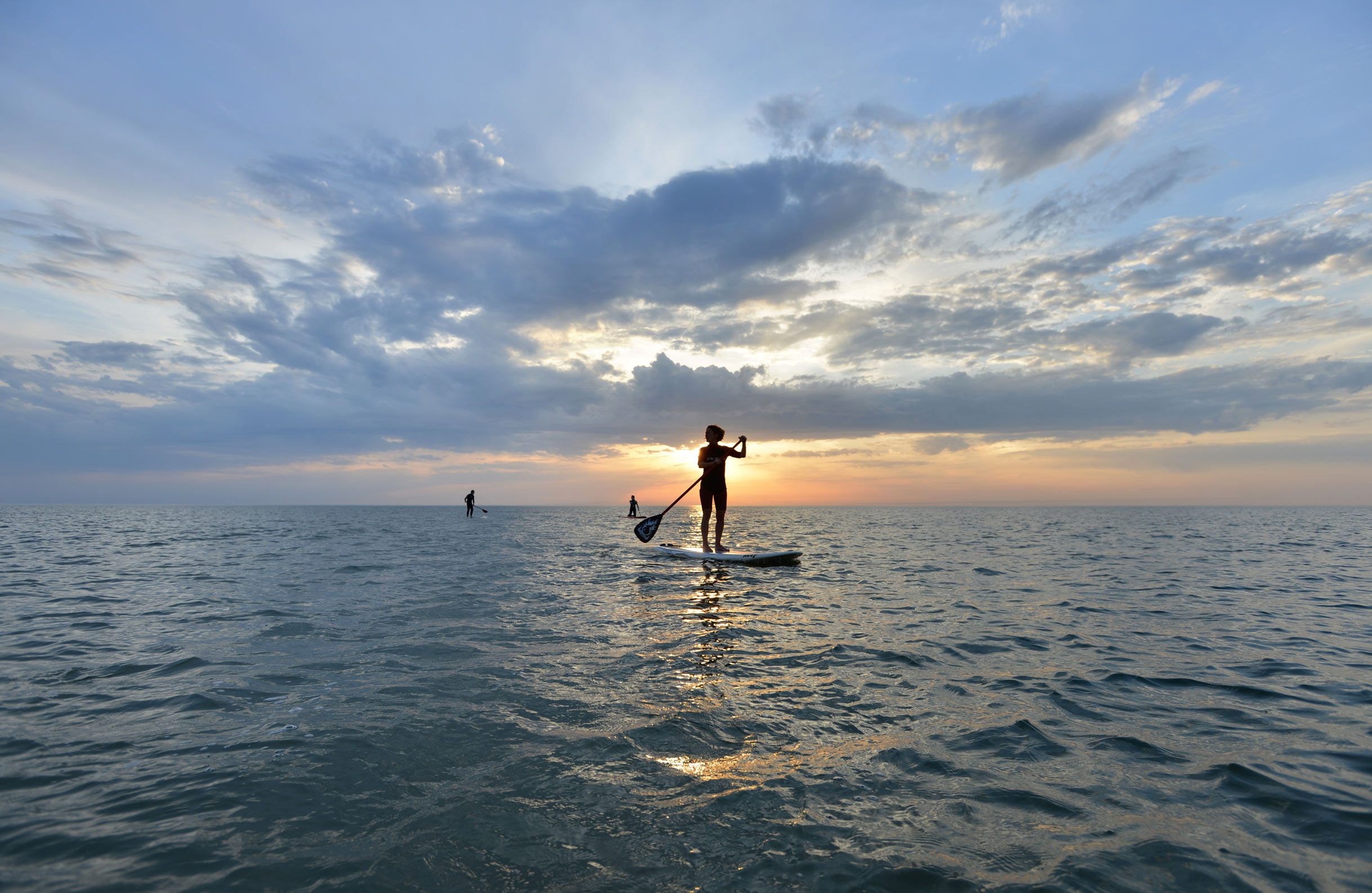 Relax and glide across the water at Cayeux-sur-Mer enjoying a spot of paddleboarding
