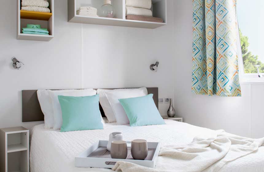 Bedroom in one of the rentals at Camping Ferme des Aulnes in Northern France