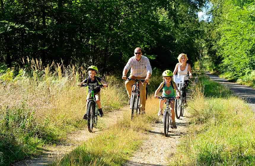 Head off on a family forest adventure - there's bike hire on site at Cabanes de La Réserve 
