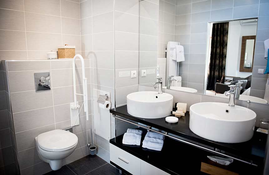 The luxury bathrooms at Domaine-de-Barive hotel in Sainte-Preuve in Northern France