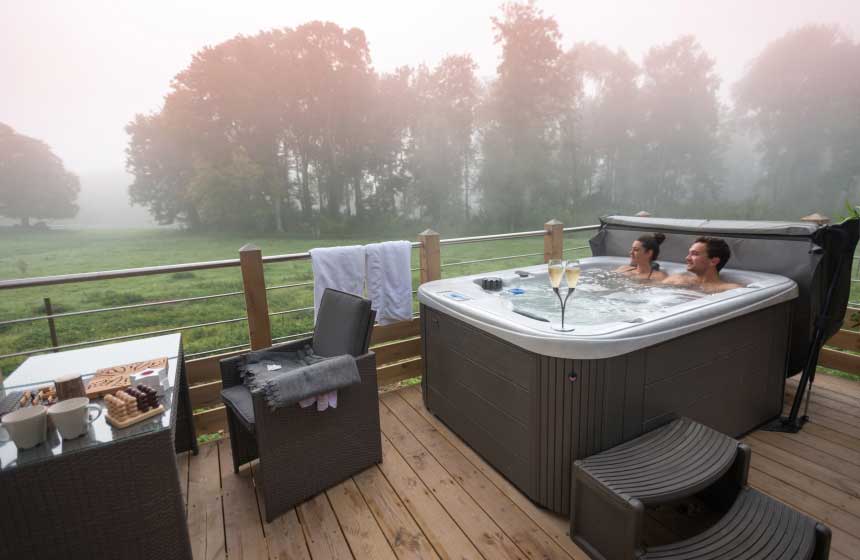 Your own private hot tub at Domaine de Vadancourt's lodge is a treat for the whole family