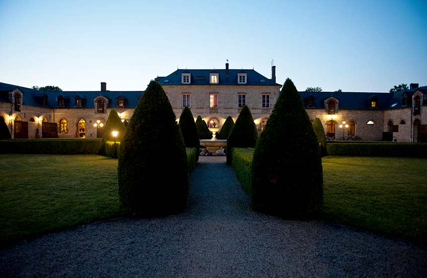 The elegant façade of the chateau-hotel Domaine-de-Barive