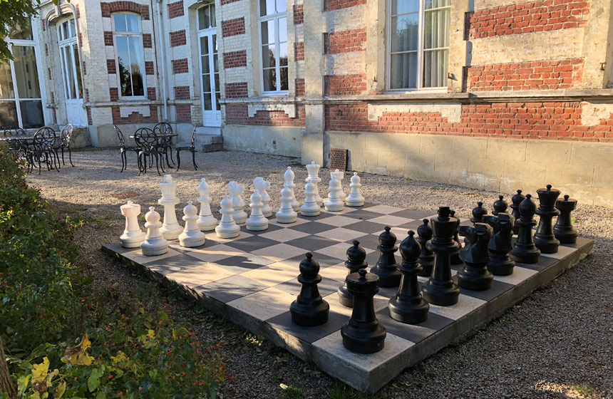Giant outdoor chess provides a fun, competitive element to your French château holiday!