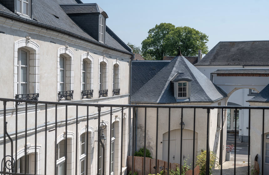 The hotel’s balconied terrace overlooks the tranquil courtyard
