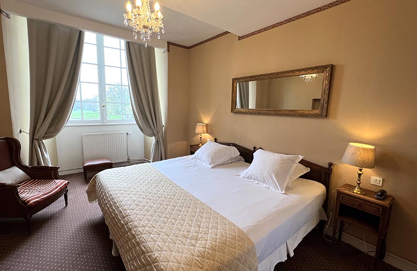 Expect classic chateau elegance in the lavish bedrooms of this Ermenonville hotel