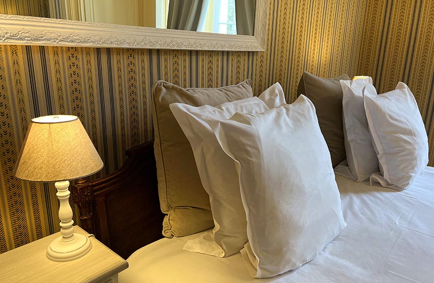 One of Chateau d'Ermenonville’s elegant Deluxe bedrooms