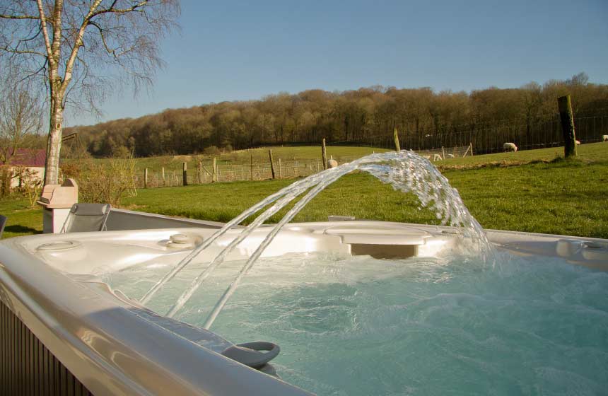 Enjoy a dip in the hot-tub overlooking Villa des Groseilliers’ lovely garden