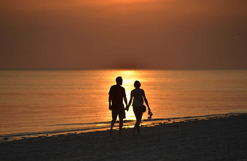 Press the stop button on life to enjoy a romantic beach walk and sunset in Northern France