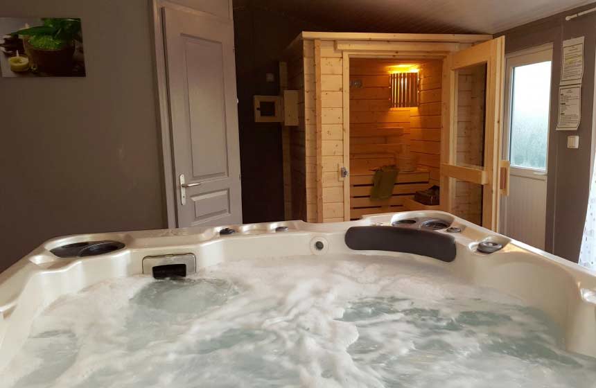 Enjoy exclusive use of the spa lodge (sauna and jacuzzi) at Camping de la Ferme des Aulnes, Northern France