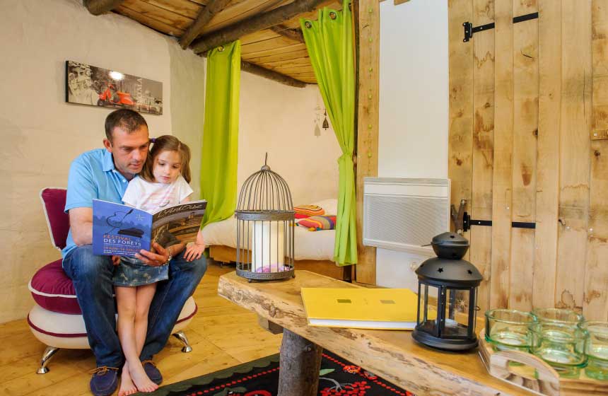 The delightfully unusual cottage at Camping Coeur de la Foret in Pierrefonds has a cosy family feel 
