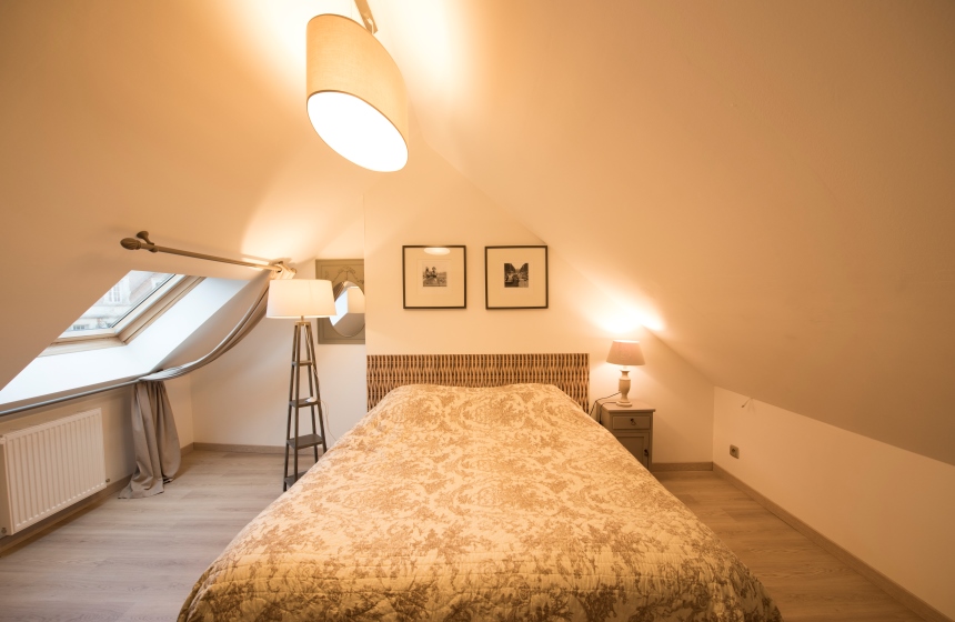 The Domice apartment’s cosy bedroom at Château d’Omiécourt in northern France