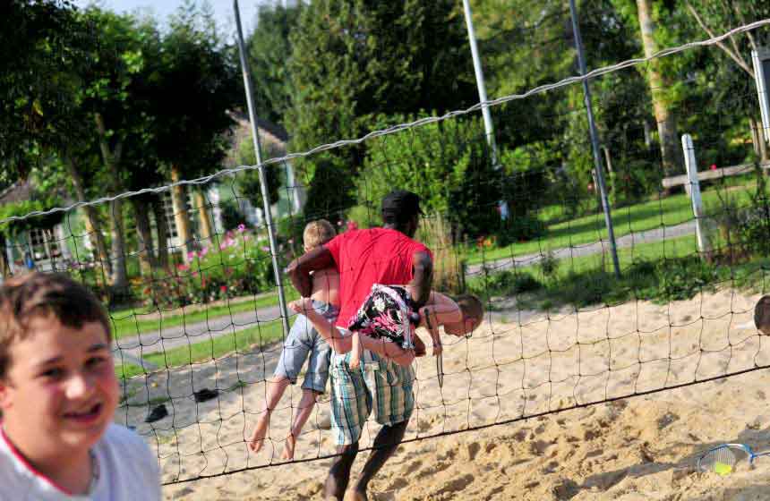 Enjoy volleyball on your family weekend break at Camping Ferme des Aulnes in Northern France