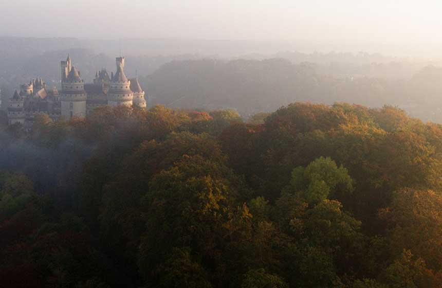 Mighty Château de Pierrefonds emerging from the mist is a sight to behold