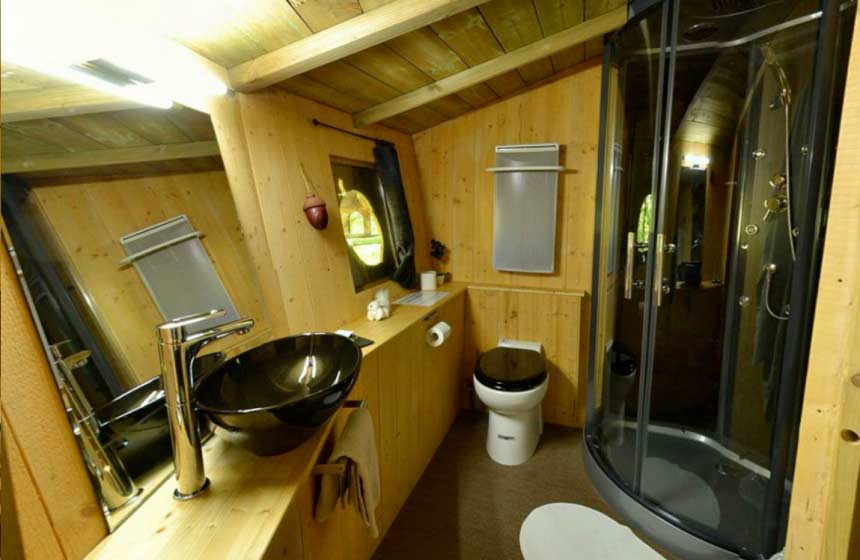 The treehouse's shower room at Château des Tilleuls in Northern France