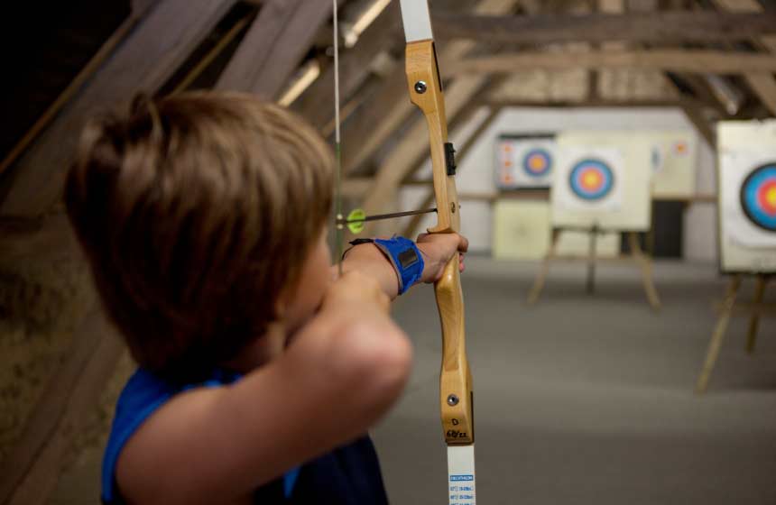 Have a go at archery on your family weekend break at Camping Ferme des Aulnes