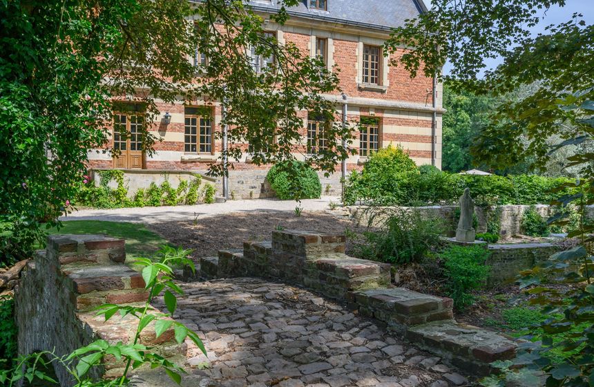 The grounds at Le Clos Barthélemy manor house in Northern France, perfect for a romantic stroll