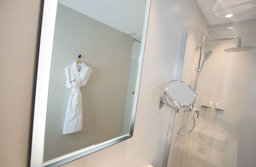 Your bathroom ‒ complete with luxurious robes and slippers…