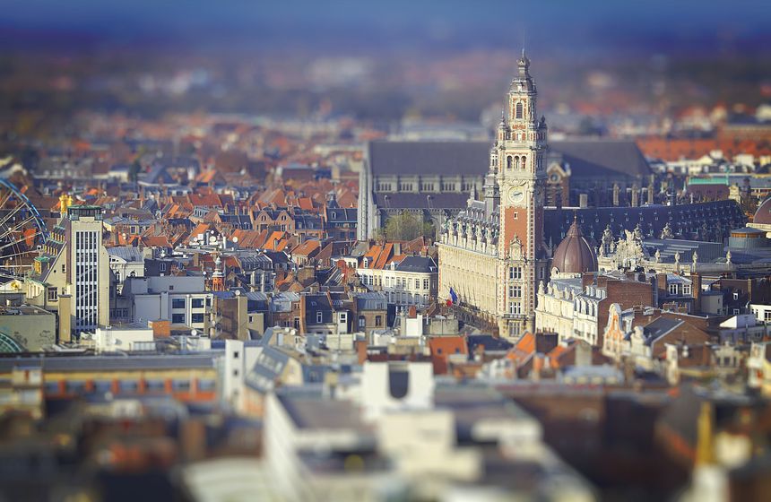 Taking in the cityscape from the top of the Hotel de Ville's belfry is a wow of a view!