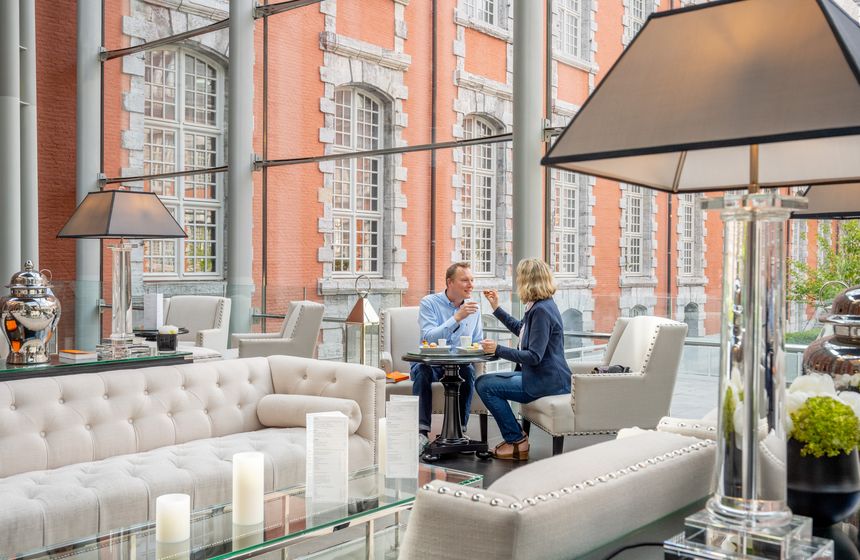 The light-filled and luxurious Atrium bar at the Royal Hainaut Hotel & Spa in Valenciennes