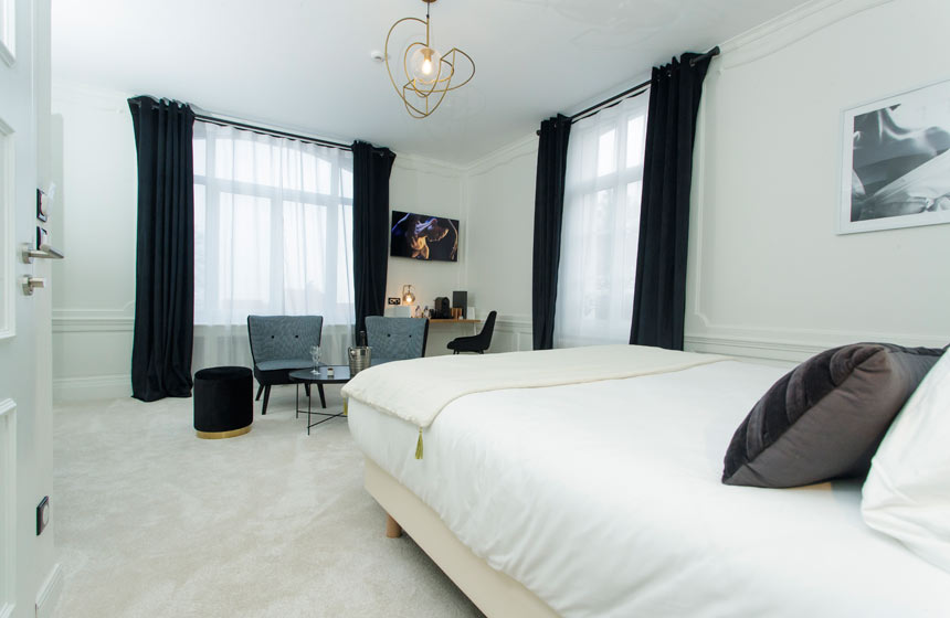 The luxury Guerlain suite at Hotel Echappée en Baie oozes the contemporary monochrome look