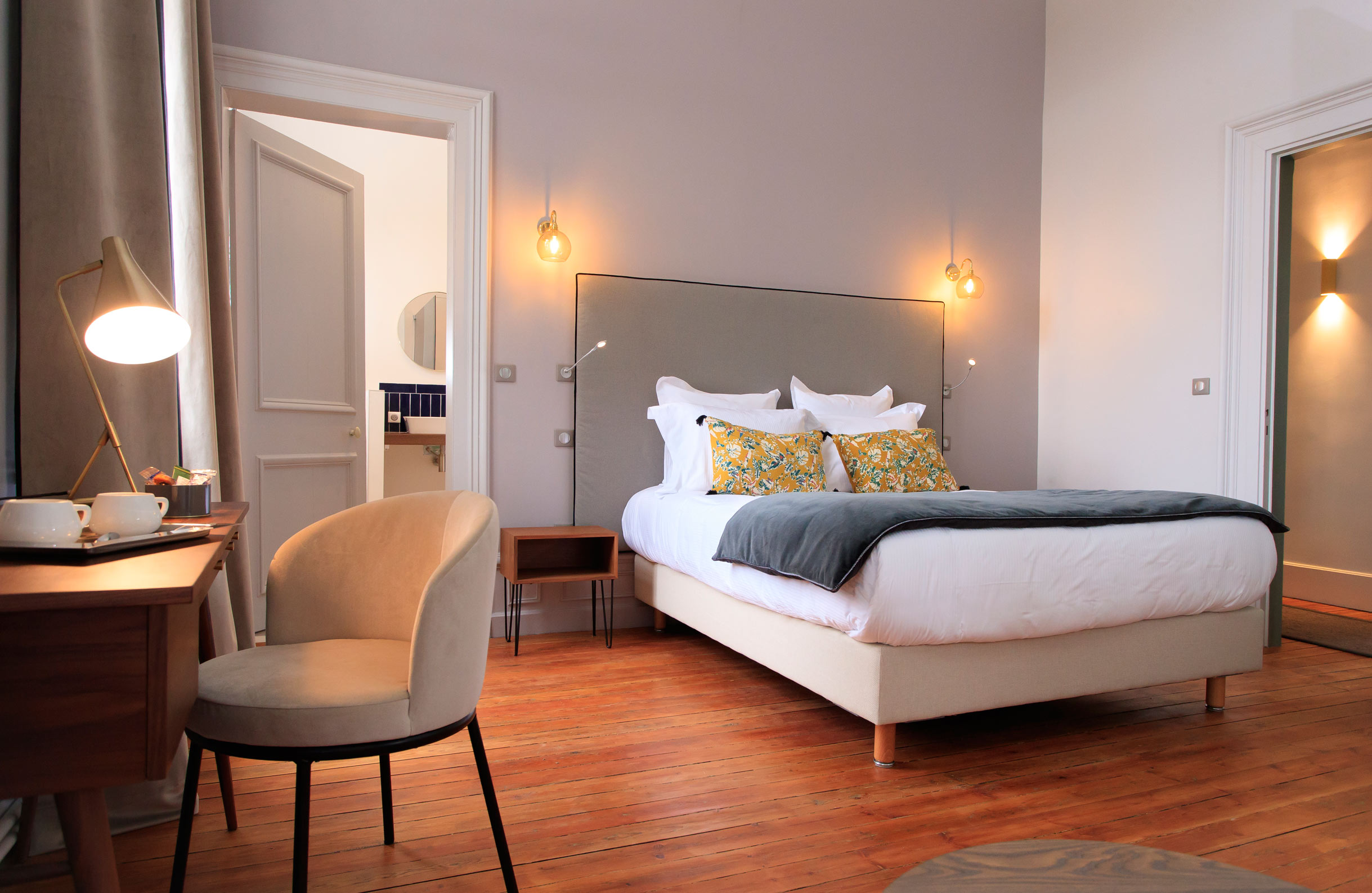 Soft tones and beautiful lighting in Villa Varentia's 'Louise Bonne' room - perfect for romantic weekend breaks