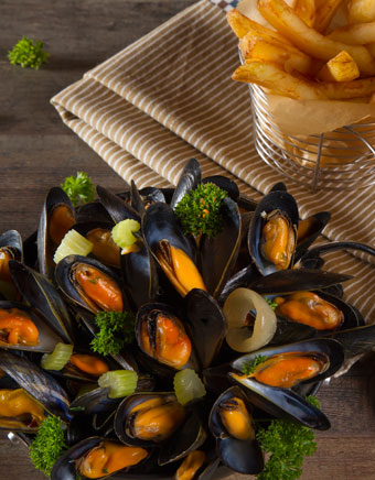 Introduce children to mussels and chips in Northern France