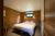 The master bedroom at Maison des Oiseaux at the Domaine du Lieu Dieu