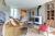 The sitting room is all the more relaxing for its woodburner