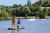 Paddleboarding on the lake at the Domaine du Lieu Dieu in Beauchamps