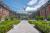 The grand main courtyard of the Royal Hainaut Hotel & Spa in Valenciennes